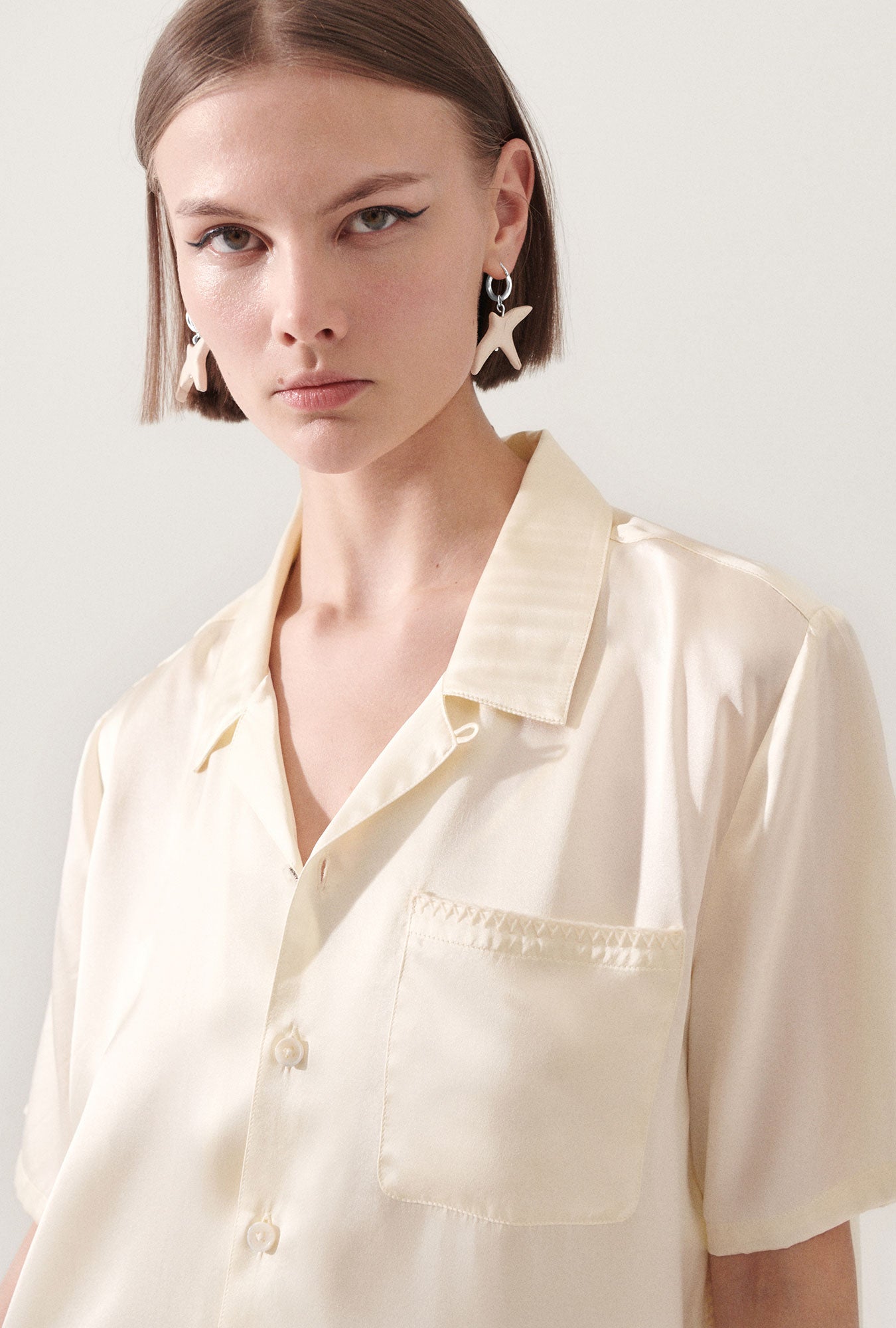 Raven Earrings White